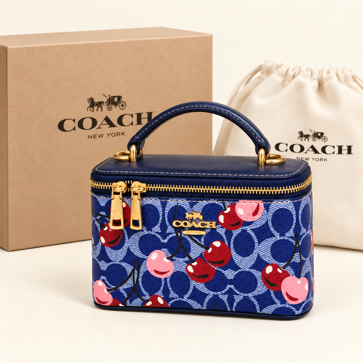 Coach Mini vanity cerises — Monogramme bleu avec boîte et housse